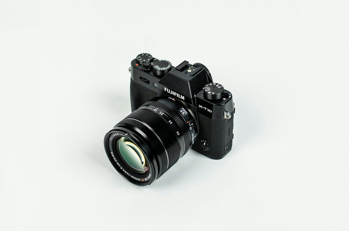 Camera and photography equipment in a creative workspace