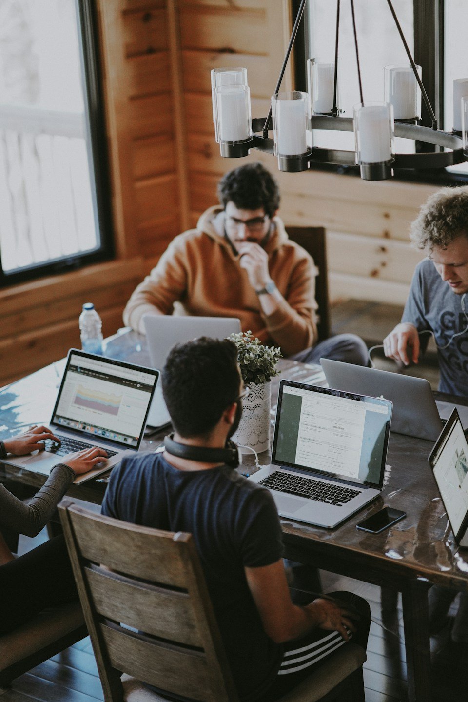 Marketing team discussing work around a table